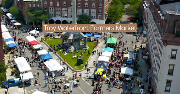 A busy farmers market is taking place in Troy Waterfront.
