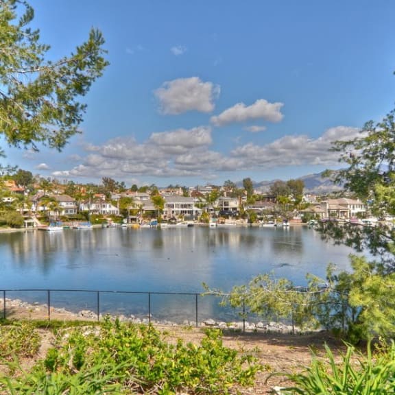 a body of water with a city in the background at Bella Vista, Mission Viejo, CA