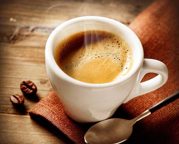 a cup of coffee on a table