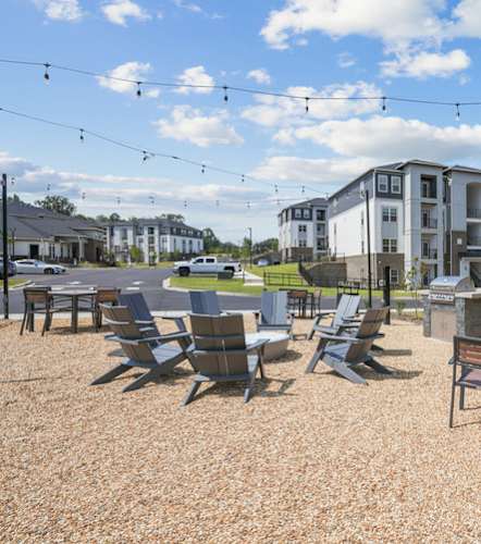 Set of chairs outside in the courtyard of our Indian Land apartments.