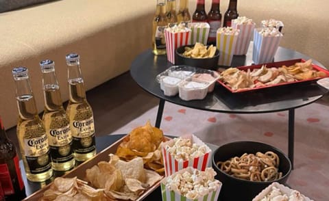 a table with a variety of food and drinks on it
