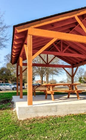 a picnic pavilion with a picnic table in a park at Trails Corner Apartments, Raleigh, NC, 27610
