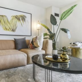 a living room with a couch and a table