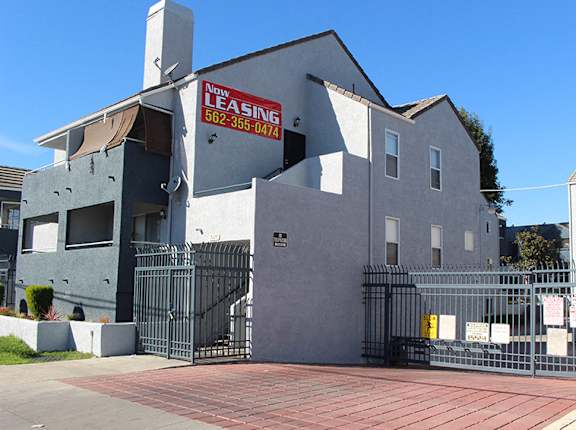A house with a leasing sign on it.