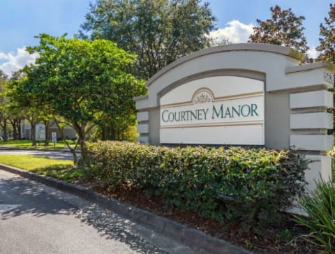 Property exterior sign facing street