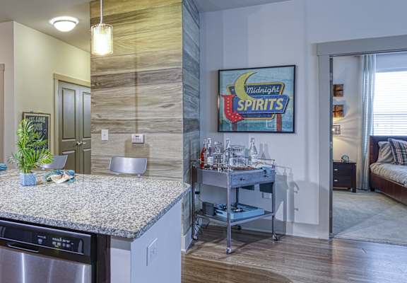 Modern Kitchen with Stainless Appliances at 4700 Colonnade Apartments in Birmingham, AL