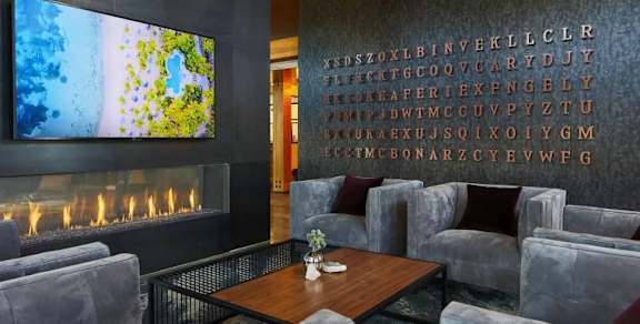Lounge Area With TV And Fireplace at Postmark Apartments, Shoreline, 98155