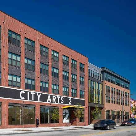 A red brick building with the words "CITY ARTS 2" on the front.