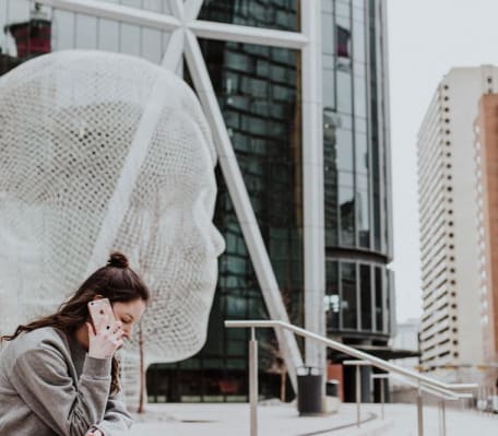 Woman on the phone in downtown Calgary