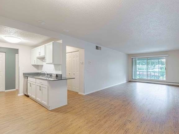 Impressive Living Room at Miramonte Lodge, Milwaukie at Astor Place of Edina Apartments , Minnesota