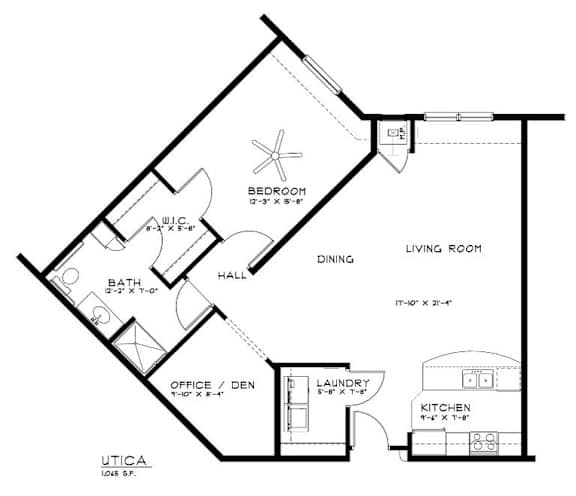 A floor plan of a house with a living room, dining room, kitchen, and laundry area.