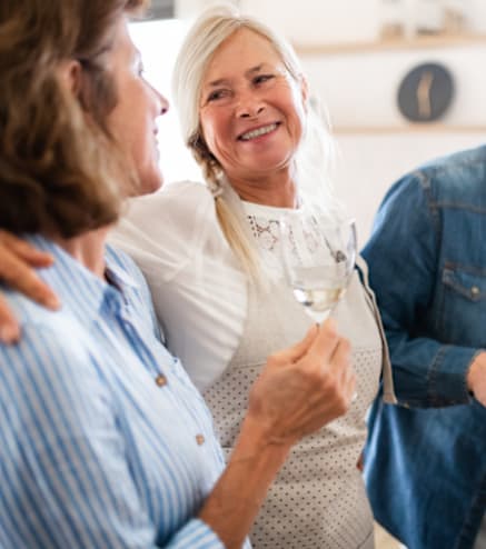 a group of people cooking together in a kitchen