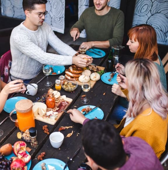 friends eating dinner at a table