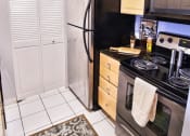 Thumbnail 10 of 15 - Fully Equipped Kitchen With Modern Appliances at  Integrity Medina Apartments, Integrity Realty LLC, Ohio, 44256