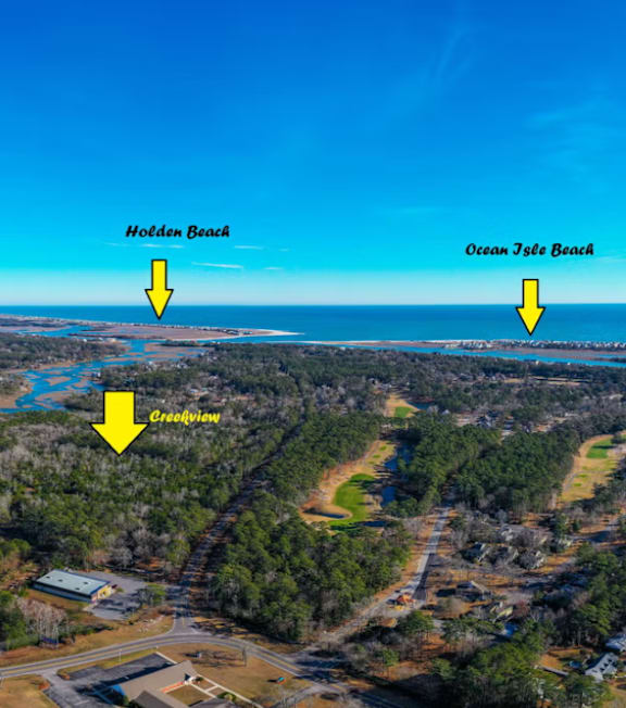 An aerial view of a coastal area with Holden Beach, Ocean 750 Beach, and a community named Graysville.