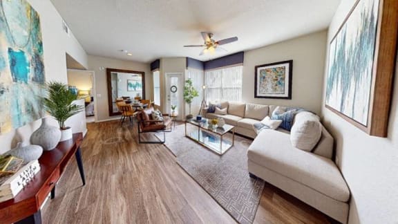 a living room with a couch and a table at The Equestrian by Picerne, Nevada, 89052