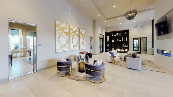 a living room filled with furniture and a fireplace