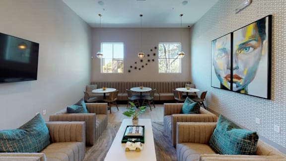 a conference room with a table and chairs and a tv