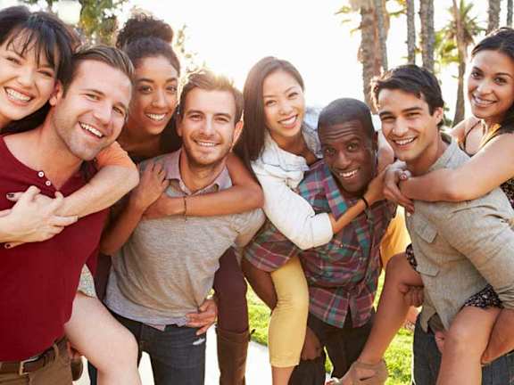 a group of friends posing for a picture