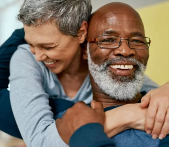 a man and a woman hugging