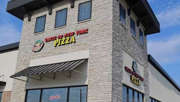A pizza restaurant named "Pizza New York" is open for business.