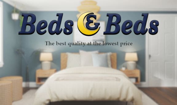 A bedroom with a bed, nightstands, and a lamp.