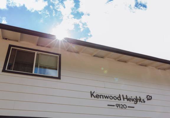 the exterior of a kennedy heights trailer with the sun shining on the roof