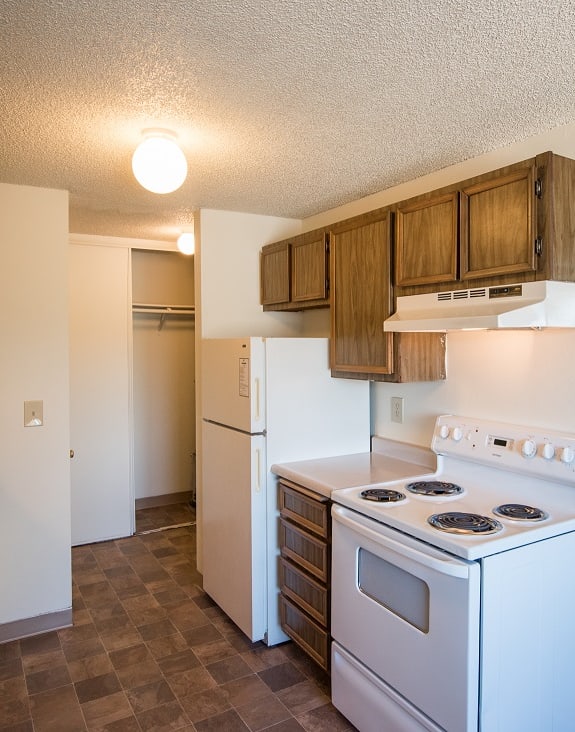 Vacant kitchen and appliances at Rolling Hills Apartments, Tualatin, Oregon 97062