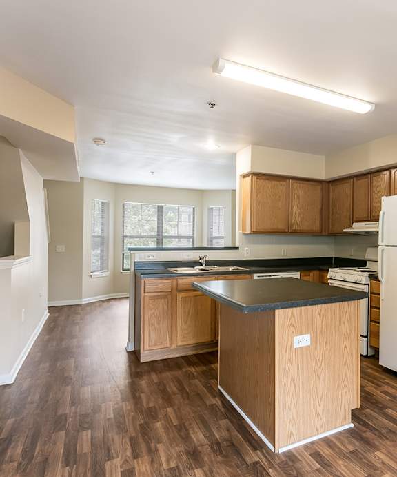 Kitchen and dining area of a townhome at Jazz District in KC