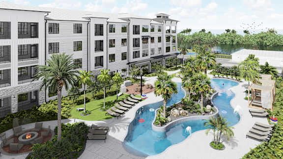 A resort with a pool and palm trees.
