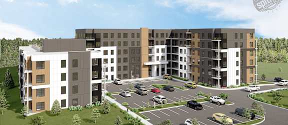 A rendering of a multi-story apartment complex with a parking lot in front.