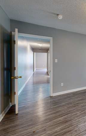 Sidewalk leading to a front entrance for a residential unit.