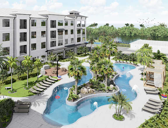 A resort with a pool and palm trees.