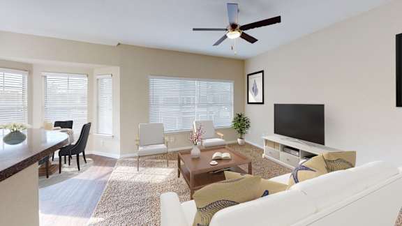 a living room with a ceiling fan and a television at The Legends at Eagle Mountain Lake, Fort Worth, 76179