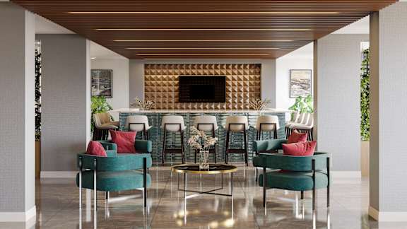 A modern living room with a fireplace and comfortable seating. at Refinery at Pointe17 Apartments, Phoenix, AZ, 85085