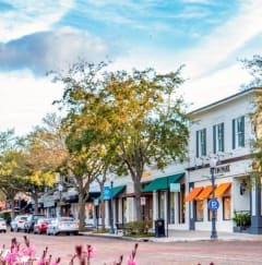 a city street with cars parked on the side of the road at Oak Reserve at Winter Park, Winter Park, Florida