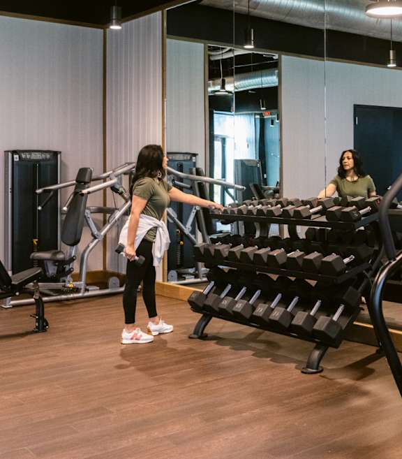 Gym with free weights at Anthem House, Alabama, 35806