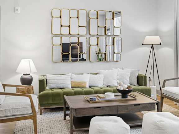 Equipped Living room with couch and chairs at The Isley at Windsor Hill, North Charleston, SC, 29420
