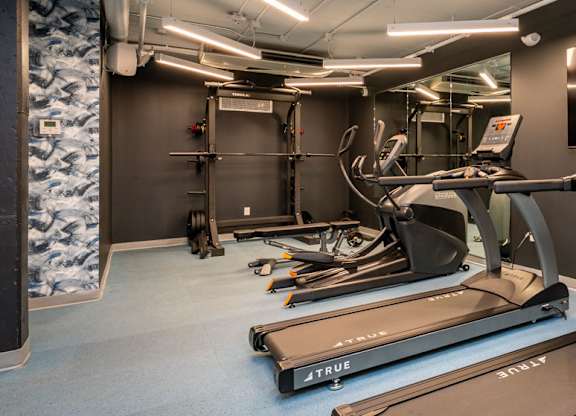fitness room with tv and cardio machines at Union 346, Massachusetts, 02143