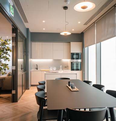 A modern kitchen with a dining table and chairs at Cherrywood Apartments, D18 VY3V, DUBLIN 18