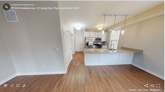 A well-lit, spacious study floor apartment with a kitchenette.