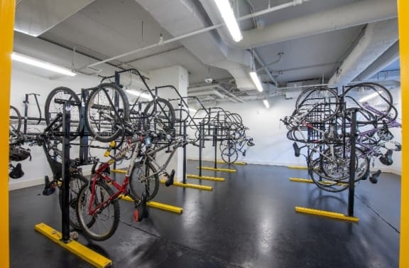 a room filled with lots of bikes sitting next to each other