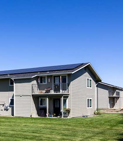 a house with solar panels on the roof