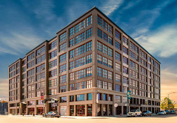 exterior of the aqua via building at Aqua Via Apartments, Oakland, CA