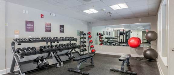 the gym at the place apartments