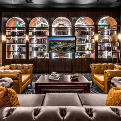 a living room with couches and a coffee table