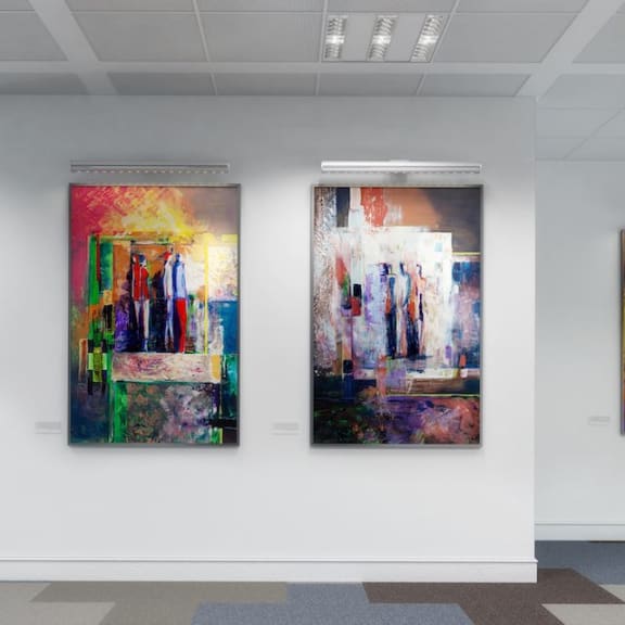 a group of three paintings hanging on a wall at Cedar Heights, Kirkland, WA 98034