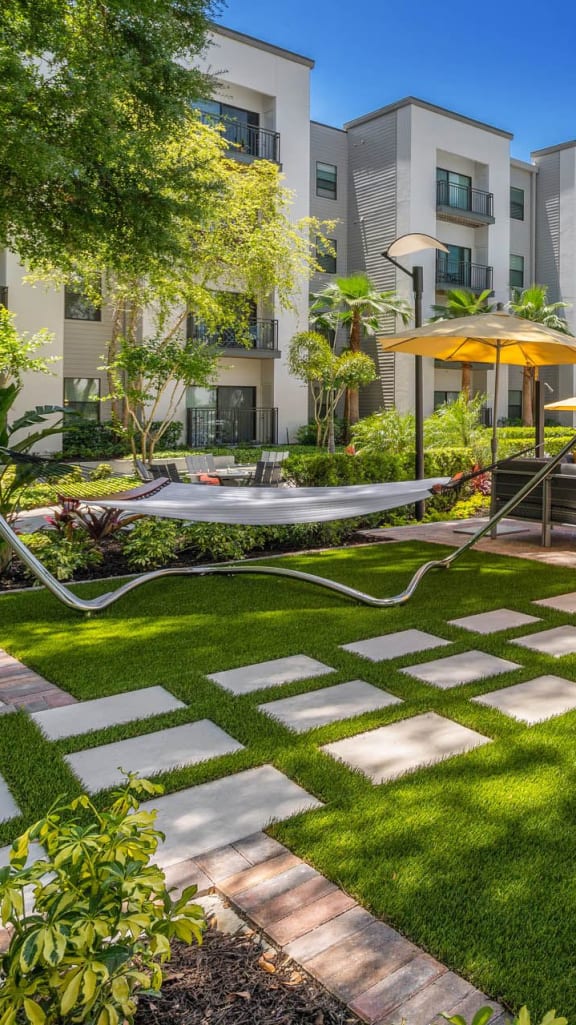 our apartments have a large pool and lounge chairs