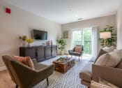 Thumbnail 3 of 33 - a living room with couches and chairs and a television at Edgebrook Residences, Merrimack, NH 03054