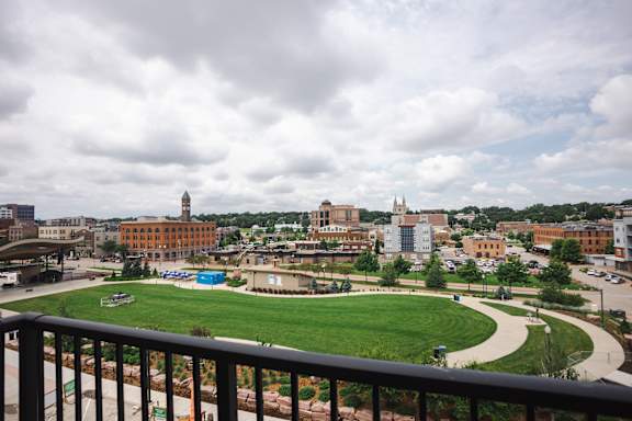 A view of a city from a balcony.